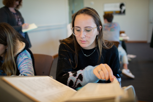 Student reading newspaper