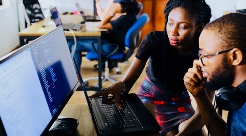 students working on computer